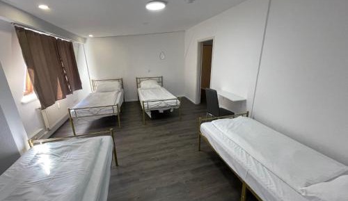 Quadruple Room with Shared Bathroom