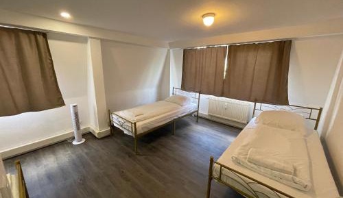 Triple Room with Shared Bathroom