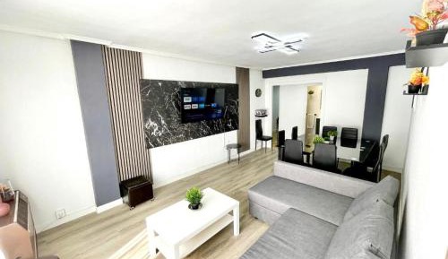 Four-Bedroom Apartment with Balcony 