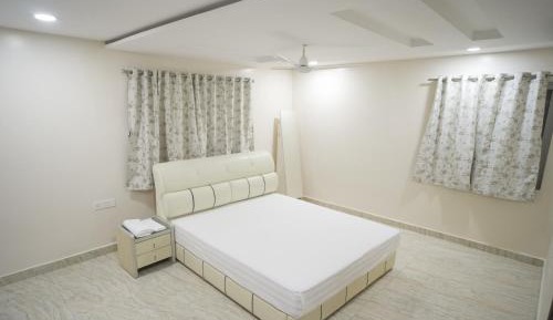 One-Bedroom Apartment with Balcony and City View