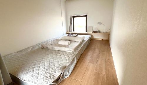 Single Bed in Male Dormitory Room with Shared Bathroom