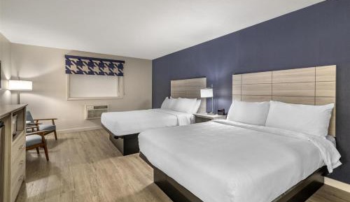 Queen Room with Two Queen Beds and Walk-In Shower - Pet Friendly/Non-Smoking