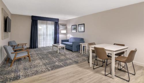 One-Bedroom Queen Suite with Two Queen Beds, Sofa Bed and Kitchenette - Non-Smoking