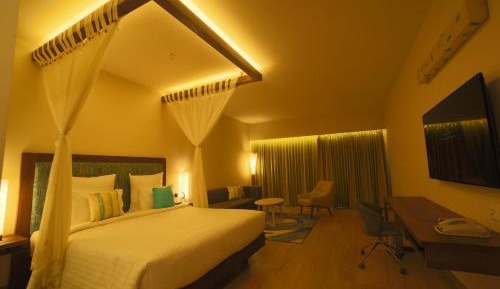 Deluxe Room with 1 Double bed, Executive Floor with Happy Hours from 1900 Hours to 2000 Hours selected IMFL brands & 10% Discount on Laundry, Food & Soft Beverage.