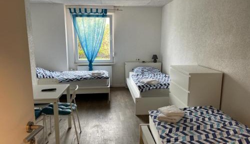 Triple Room with Shared Bathroom