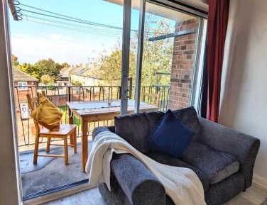 Three-Bedroom Apartment with Balcony