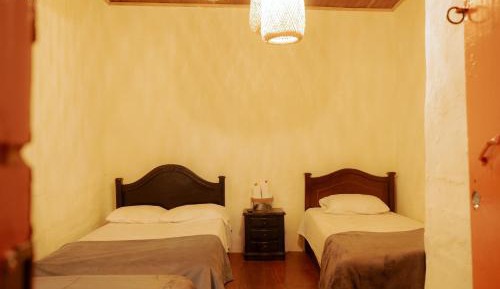 Economy Quadruple Room with Shared Bathroom