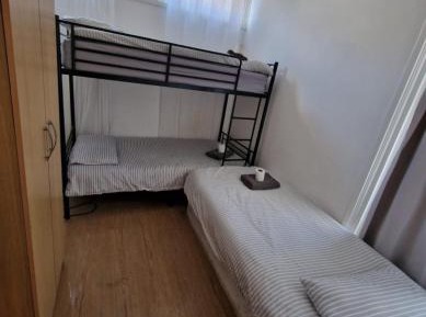 Single Bed in Dormitory Room