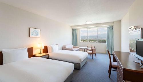 Classic Twin Room with Sofa Bed and Mountain View