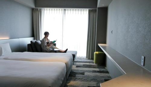 Twin bed room with ocean view terrace