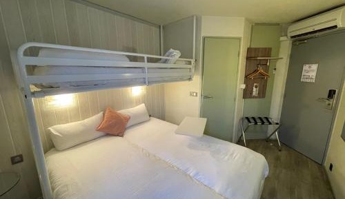 Triple Room (2 Adults + 1 Child)