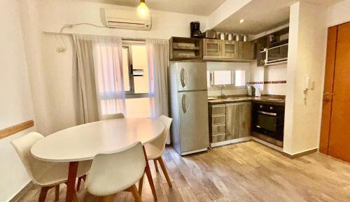 One-Bedroom Apartment with Balcony and City View