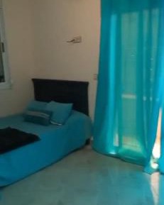 Three-Bedroom Apartment with Balcony