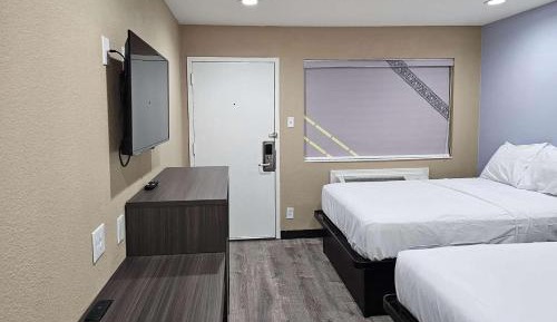 Double Room with Two Double Beds and Roll-in Shower - Mobility Access/Non-Smoking