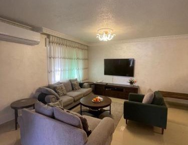 Three-Bedroom Premium Apartment with Balcony