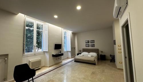 One-Bedroom Apartment with Balcony and City View