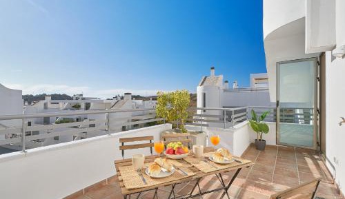 Two-Bedroom Apartment with Balcony and Terrace