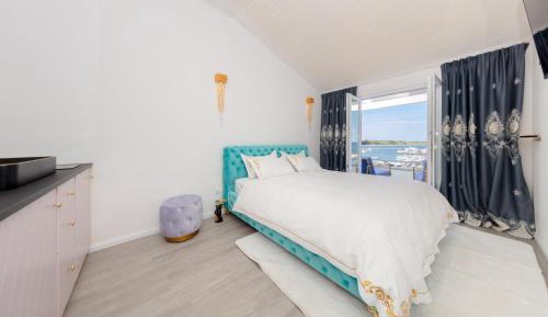 One-Bedroom Apartment with Balcony and Sea View