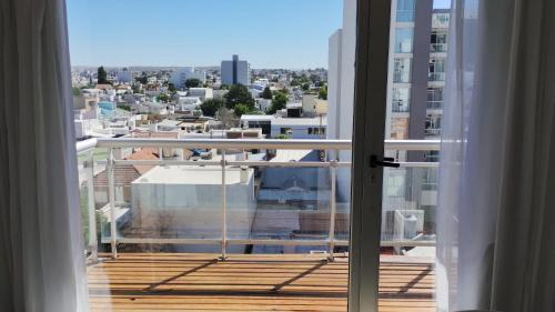 One-Bedroom Apartment with Balcony and City View