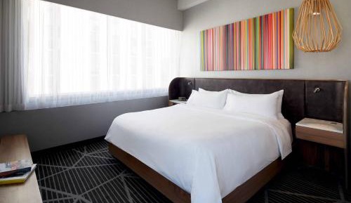 One-Bedroom King Suite with Sofa Bed and Whirlpool - City View