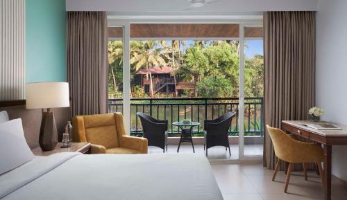 Deluxe Room with River View & Balcony - 1 child below 12 stays for free (upto Nov 30 check-in) + Beer on arrival + Happy Hours (6-8PM)