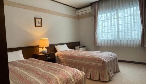 Twin Room with Private Bathroom