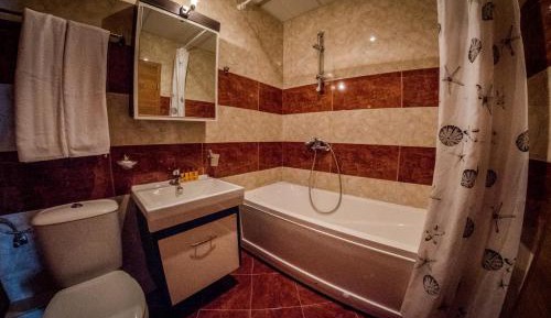 One-Bedroom Apartment with Balcony (2 Adults + 2 Children)