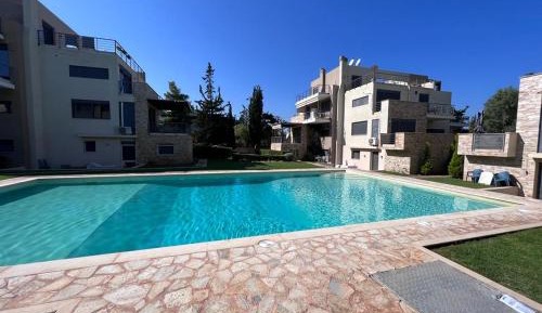Three-Bedroom Apartment with Balcony