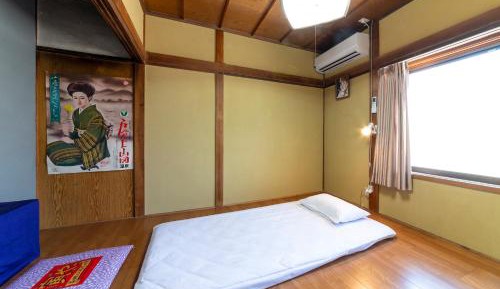 Single Bed in Dormitory Room