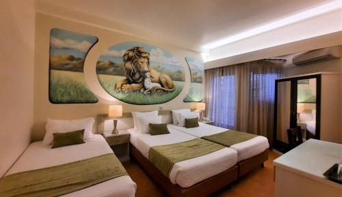 3 Single Beds with Balcony
