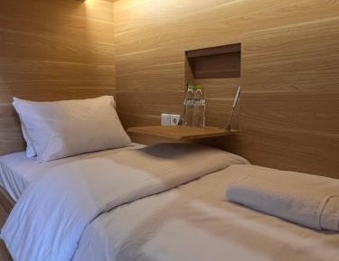Single Bed in Male Dormitory Room