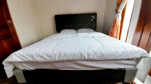 Standard Double Room with Shared Bathroom