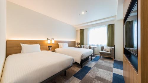Deluxe Twin - Separate Bathroom & Toilet  for 1 Adult - Non-Smoking