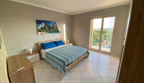 Three-Bedroom Apartment with Balcony