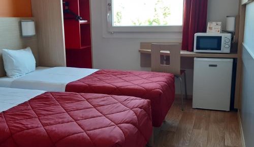 2 Single Beds - Essentiel Plus Room