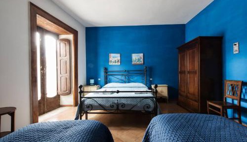 Quadruple Room with Private Bathroom