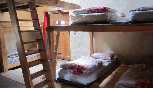 Single Bed in Dormitory Room