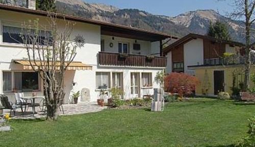 Three-Bedroom Apartment with Balcony and Garden