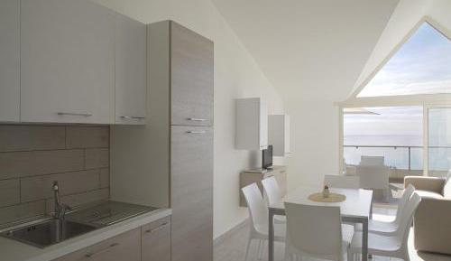 One-Bedroom Apartment with Side Sea View