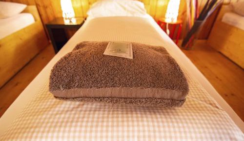 Single Bed in Dormitory Room with Shared Bathroom