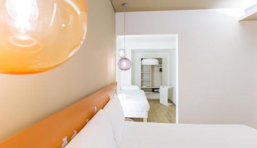 Superior Room with One Queen Bed and One Single Bed