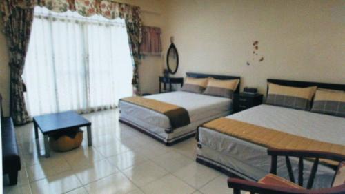 Quadruple Room with Private Bathroom