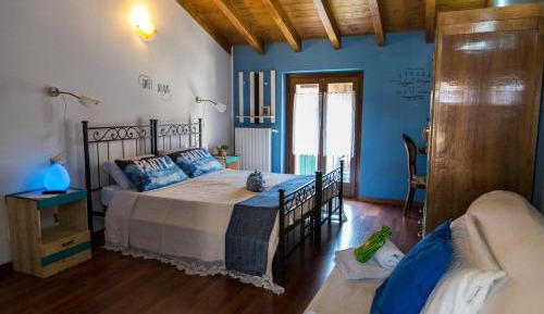 Quadruple Room with Private Bathroom