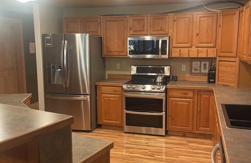 Joseph Cabin | Cozy cabin on a quiet dead end street with a large deck and outdoor kitchen