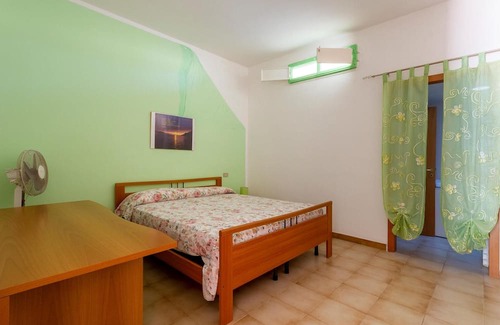 Mattinata Apartment | Enjoy a magnificent view of the sea from this vacation apartment.