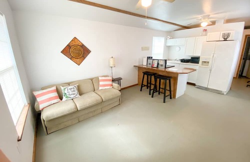 Throckmorton Cottage | Cow Co. Cottages - One Block Away From Downtown Shopping, Dining, & More!
