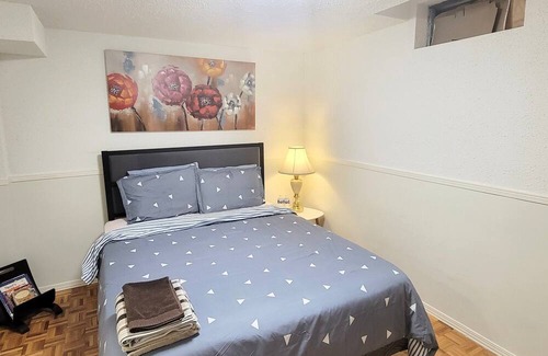 Lisgar House | Private 2-bed basement apartment with kitchen & bath. Shared laundry.