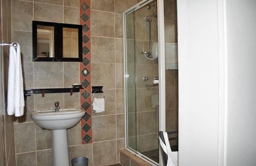 Swakopmund Bed & Breakfast | Twin Room The Lions - ideal for 2 guests near the beach in Swakopmund, Namibia