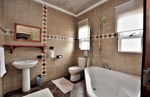 Swakopmund Bed & Breakfast | Room for 6 - Amarachi Guesthouse in Swakopmund Namibia near beach and malls!