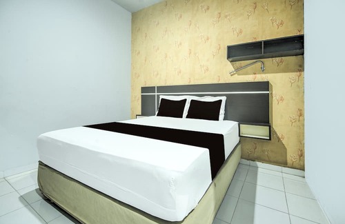 Panakkukang Hotel | OYO 94781 Hotel Lucky Inn Makassar